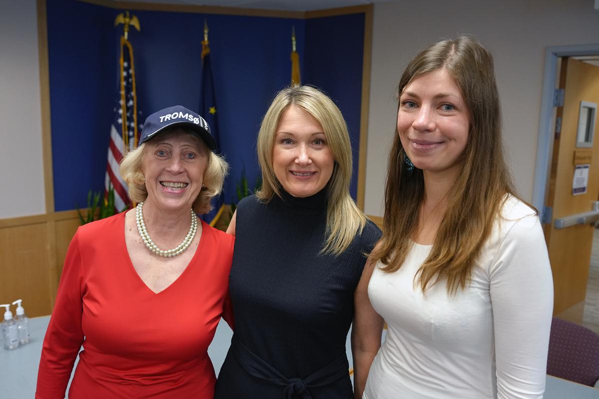 three women beside each other